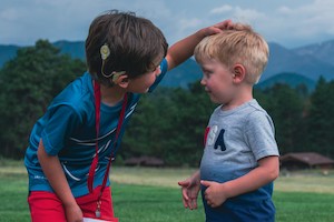 Boy with cochlear implant